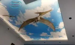 3Д таван в детска стая София - Светещ опънат таван с фотопринт - летящи Птеродактили в небето.
