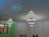 Светещ опънат таван - бял гланц с полилеи и RGB диодна лента.