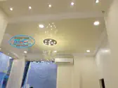 Опънати тавани в магазин Пловдив в цвят шампанско.