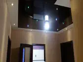 Опънати тавани в коридор - кафяв лак с диоди Звездно небе.