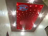 3Д Опънати тавани - опънат таван с RGB диодно осветление в червено.