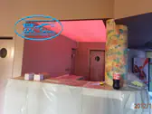 Светещ опънат таван над бар, с RGB LED осветление управлявано с дистанционно.